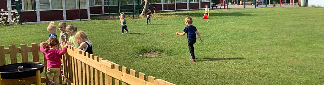 The children playing outside