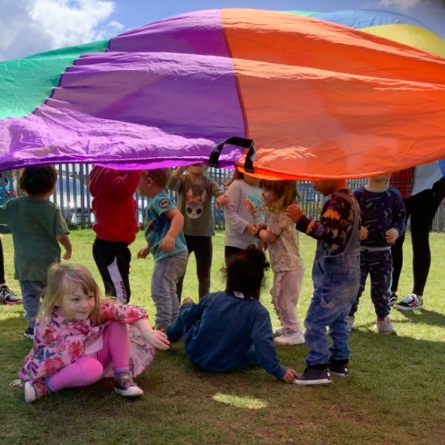 Playing under the parachute