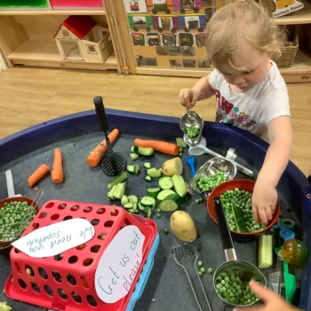 Child playing with food