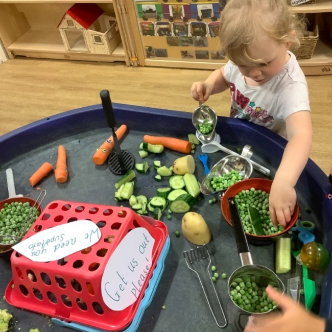 Child playing with food