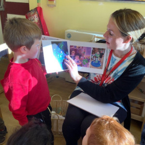 Child and teacher reading