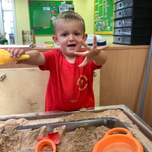 A child playing in the sand 