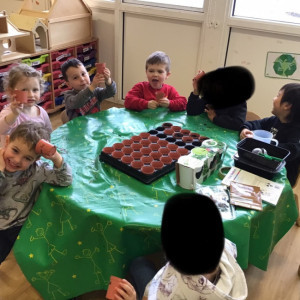 children planting seeds