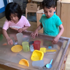 Children playing with toys. 