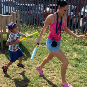 Children having a water fight 