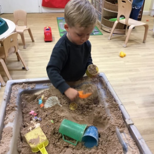 Child playing in sand