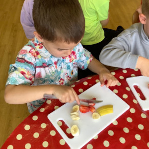 Child doing a craft. 