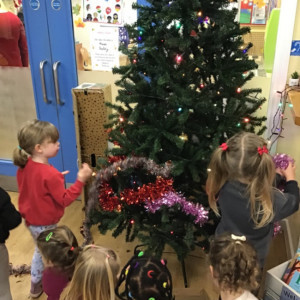 Children around the Christmas tree