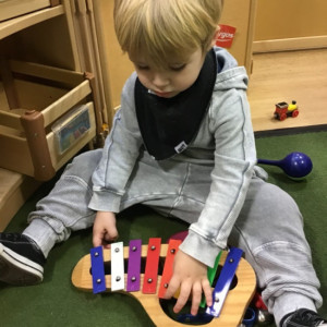 Child with a musical instrument 