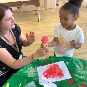 Child and teacher with an ice cream