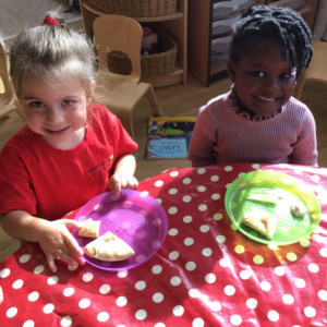 Two girls eating