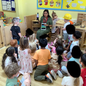 Children in a group listening to a talk