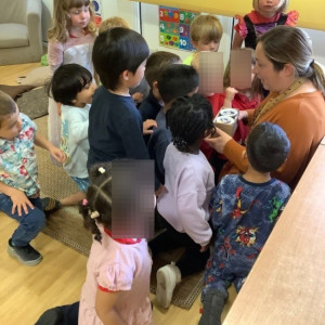 Children listening to a teacher. 