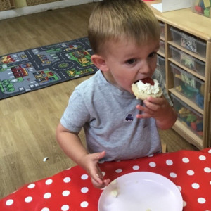 A child eating a scone