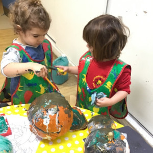 Children doing crafts and playing