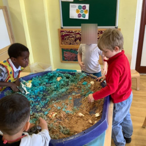 Children playing with sand. 