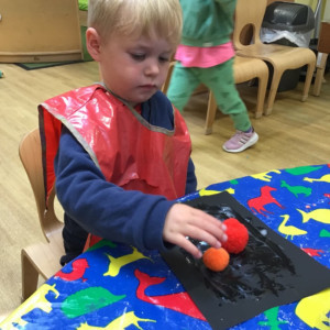 Child undertaking crafts
