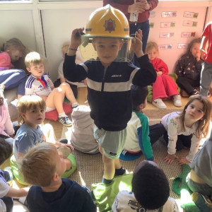 Children dressing up as a fireman 