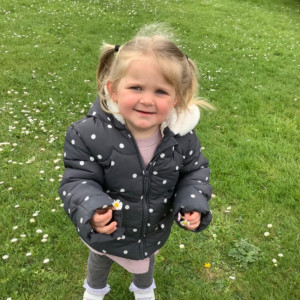 Children picking daisy's