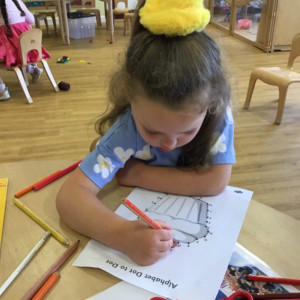 Child undertaking crafts