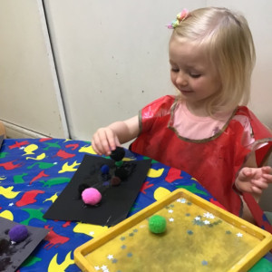 Child undertaking crafts