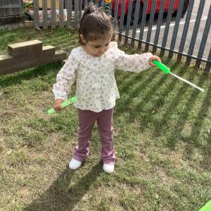 A child playing bubbles 