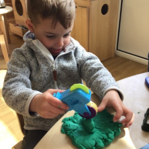Boy with play dough