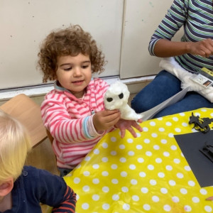 Child doing crafts and playing