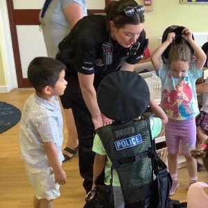 Children with a police woman