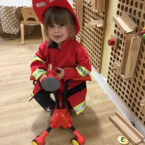 child playing dress up