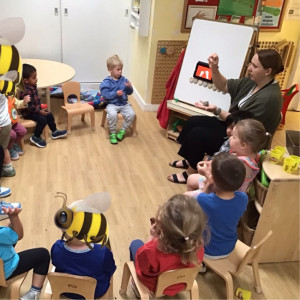 Children listening to a teacher