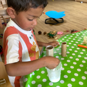 A child doing a craft 