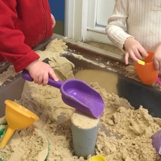 Children playing in the sand