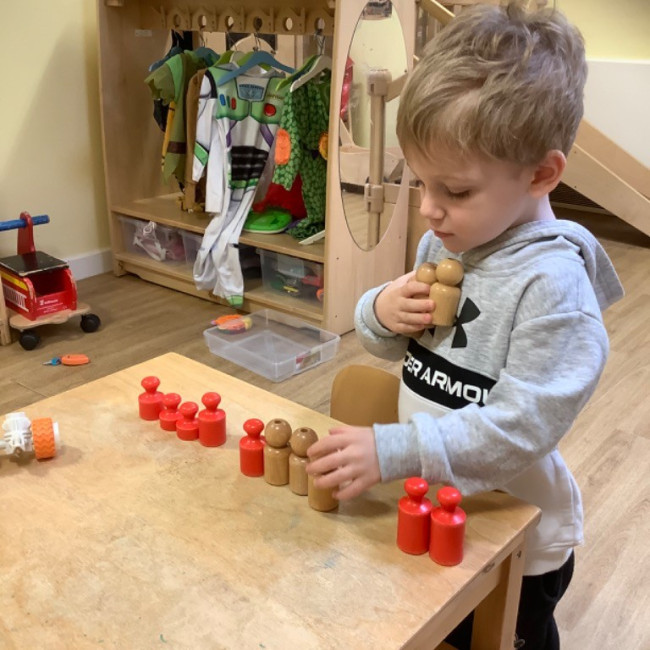 child with toys