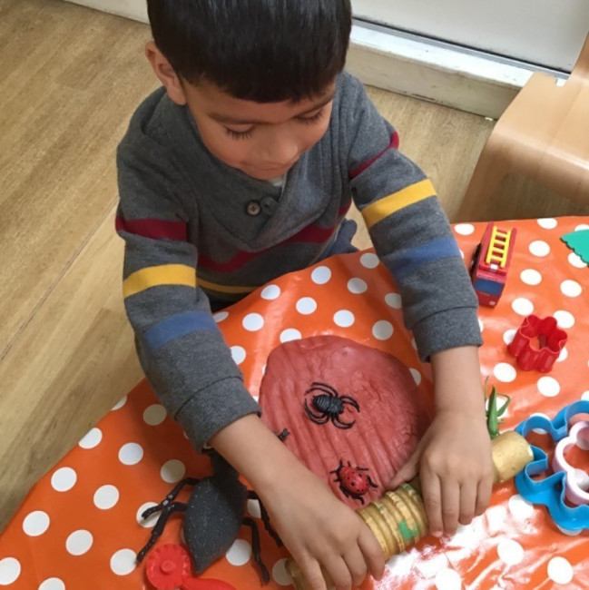 Boy with play dough