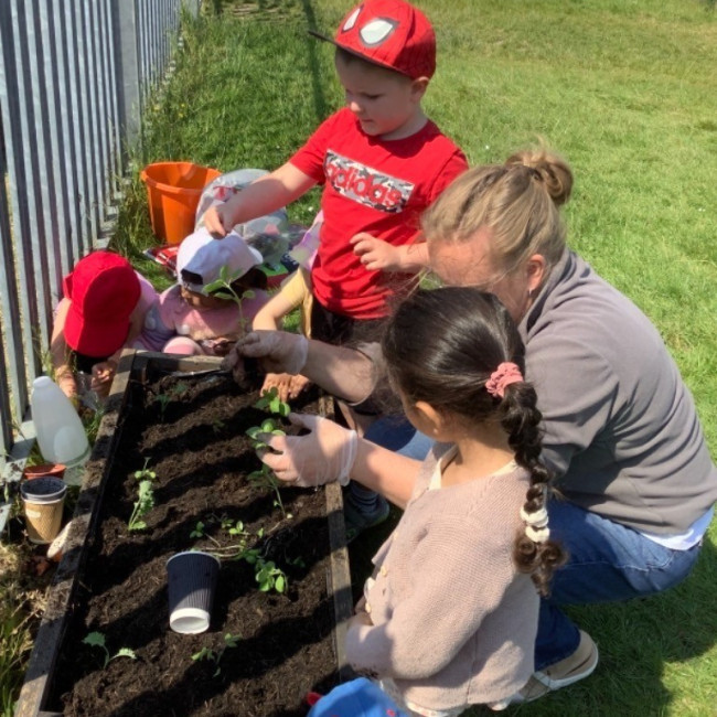 children planting