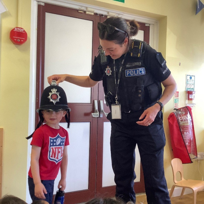A child with a police woman