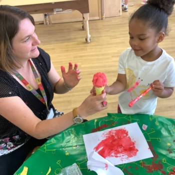 Child and teacher with an ice cream