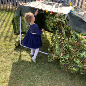 Girl playing in the den