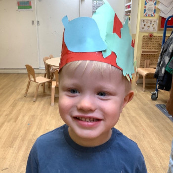 A boy with a crown