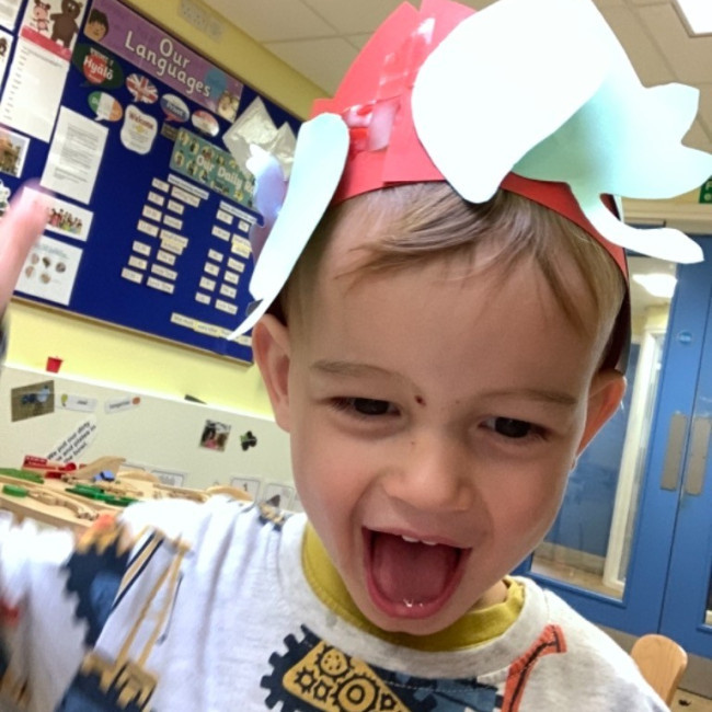 Child doing crafts and playing