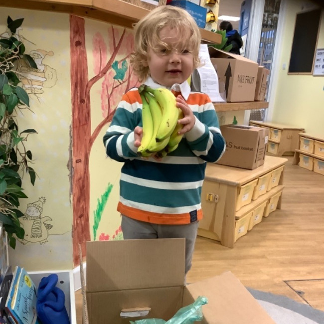 Child with fruit