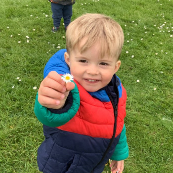 Boy with a daisy
