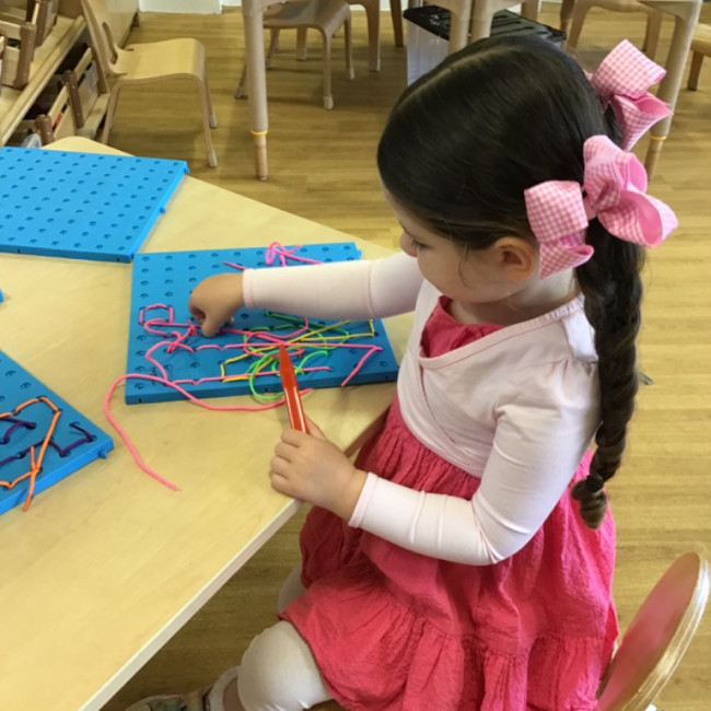 Child undertaking crafts