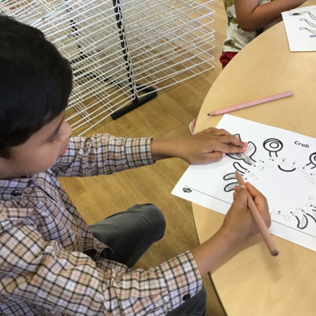 Child undertaking crafts