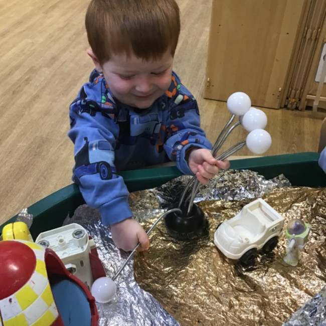 Child undertaking crafts