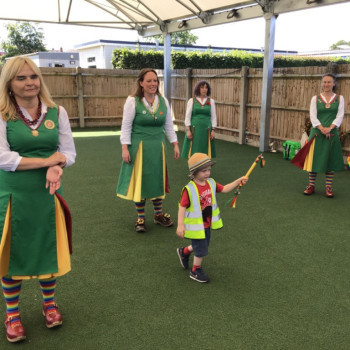 Child with morris dancers