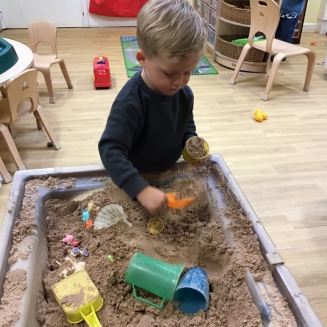 Child playing in sand