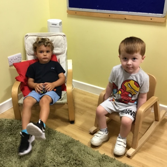 Children sitting in chairs