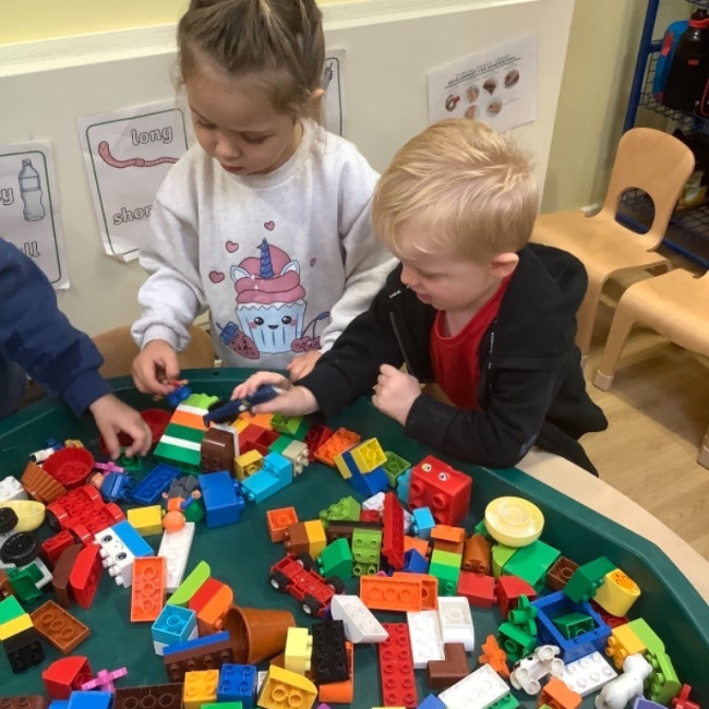 Children playing with lego